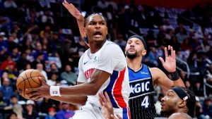 Detroit Pistons guard Ausar Thompson (9) looks to pass the ball against Orlando Magic centre Wendell Carter Jr., right, and guard Jalen Suggs (4) during the first half in Game 5 of a first-round NBA basketball playoffs series Wednesday, April 29, 2026, in Detroit. (Duane Burleson/AP)