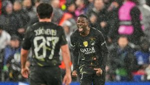 PSG's Ousmane Dembele celebrates after scoring his side's opening goal during the Champions League quarterfinal second leg soccer match between Liverpool and Paris Saint-Germain in Liverpool, England, Tuesday, April 14, 2026. (Dave Shopland/AP Photo)