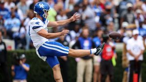Kentucky kicker Aidan Laros (48) punts the ball during the first half of an NCAA college football game against Georgia, Saturday, Oct. 4, 2025, in Athens, Ga. (Colin Hubbard/AP Photo)