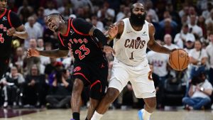 Toronto Raptors guard Jamal Shead collides with Cleveland Cavaliers guard James Harden during the second half in Game 5 of a first-round NBA playoffs basketball series, Wednesday, April 29, 2026, In Cleveland. (David Dermer/AP)