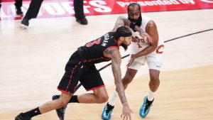 Toronto Raptors' Brandon Ingram (3) drives past Cleveland Cavaliers' James Harden (1) during first half NBA playoff basketball action in Toronto on Thursday, April 23, 2026. (Nathan Denette/CP)