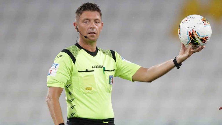 Referee Gianluca Rocchi holds the ball during a Serie A soccer match between Juventus and Roma, at the Allianz stadium in Turin, Italy (Luca Bruno/AP)
