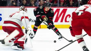 Ottawa Senators centre Tim Stutzle (18) looks for a scoring chance on Carolina Hurricanes goaltender Frederik Andersen (31) during second period NHL hockey action. (Spencer Colby/THE CANADIAN PRESS)