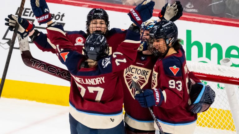 Montreal Victoire goaltender Ann-Renee Desbiens (35) celebrates with teammates after defeating the Seattle Torrent in PWHL hockey action, in Laval, Que., on Tuesday, April 7, 2026. (Christopher Katsarov/CP)