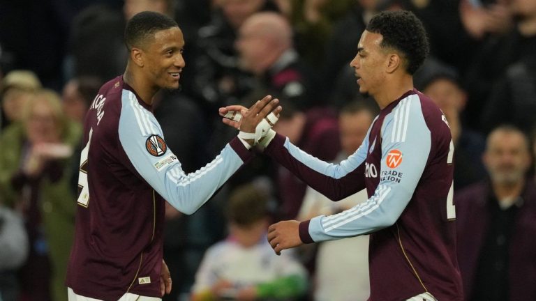 Aston Villa's Morgan Rogers, right, celebrates after scores his side's third goal during the Europa League quarterfinal second leg soccer match between Aston Villa and Bologna, in Birmingham, England, Thursday, April 16, 2026. (Dave Shopland/AP)