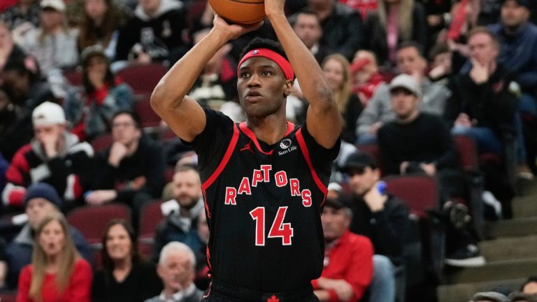 Toronto Raptors guard Ja'kobe Walter (14) handles the ball during the second half of an NBA basketball game against the Chicago Bulls, Thursday, Feb. 19, 2026, in Chicago. (Erin Hooley/AP)