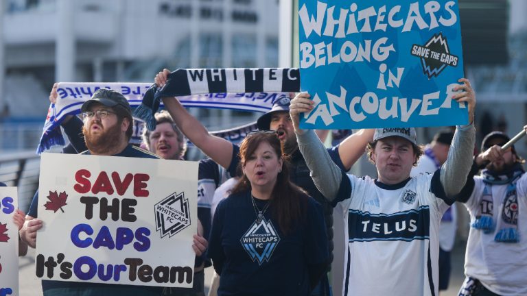 Fans of the Vancouver Whitecaps MLS soccer team rally to keep the team in Vancouver, outside the 76th FIFA Congress in Vancouver on Thursday, April 30, 2026. (Darryl Dyck/CP)