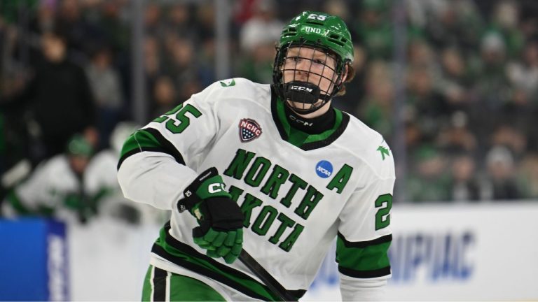 North Dakota defenseman Abram Wiebe (25) follows the puck against Quinnipiac in the third period during an NCAA hockey regional game on Saturday, March 28, 2026 in Sioux City, S.D. (Craig Lassig/AP Photo)