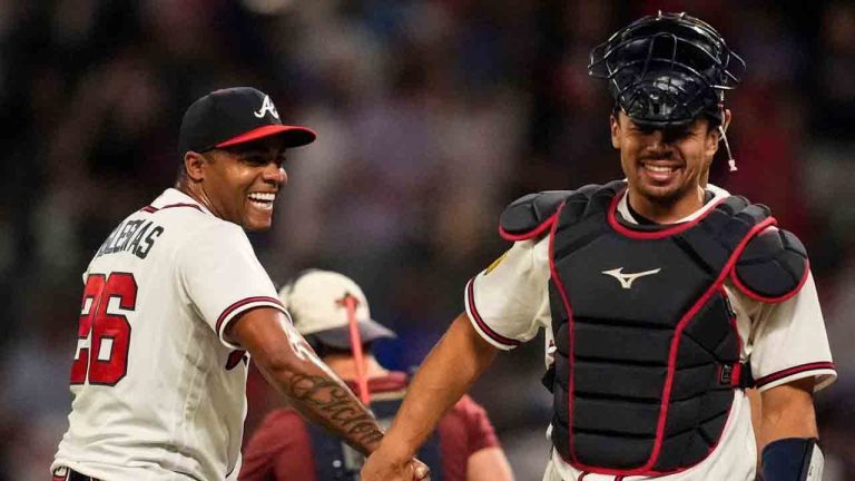 Atlanta Braves pitcher Raisel Iglesias celebrates a win over the Chicago Cubs with Drake Baldwin after a baseball game, Wednesday, May 13, 2026, in Atlanta. (Mike Stewart/AP)