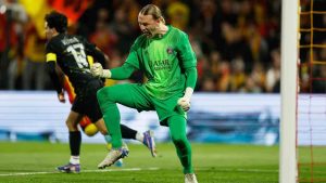 PSG's goalkeeper Matvey Safonov reacts after making a save during the French League One soccer match between Lens and Paris Saint Germain, in Lens, northern France, Wednesday, May 13, 2026. (Jean-Francois Badias/AP)