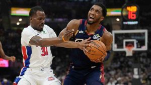 Cleveland Cavaliers' Donovan Mitchell, right, is fouled by Detroit Pistons' Javonte Green (31) in the first half of Game 4 of a second-round NBA basketball playoff series Monday, May 11, 2026, in Cleveland. (Sue Ogrocki/AP)