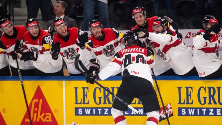 Austria's Tim Harnisch celebrates scoring during the Men's Ice Hockey World Championship preliminary round game between Latvia and Austria, in Zurich, Switzerland, Tuesday May 19, 2026. (Andreas Becker/Keystone via AP)