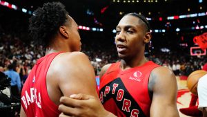 Toronto Raptors' RJ Barrett (right) celebrates with Scottie Barnes (4) after defeating the Cleveland Cavaliers in overtime NBA playoff basketball action in Toronto on Friday, May 1, 2026. (Frank Gunn/CP)