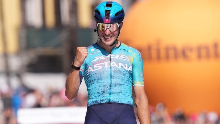 Italy's Alberto Bettiol celebrates winning the 13th stage of the Giro d'Italia cycling race, from Alessandria to Verbania, Italy, Friday, May 22, 2026. (Gian Mattia d'Alberto/LaPresse via AP)