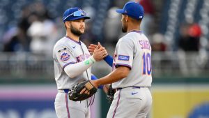 New York Mets' Bo Bichette, left, and Marcus Semien (10) celebrate after a baseball game against the Washington Nationals, Thursday, May 21, 2026, in Washington. (Nick Wass/AP)
