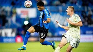 CF Montreal's Noah Streit (23) is defended by Portland Timbers' Finn Surman (20) during second half MLS soccer action in Montreal on Wednesday, May 13, 2026. (Christopher Katsarov/CP)