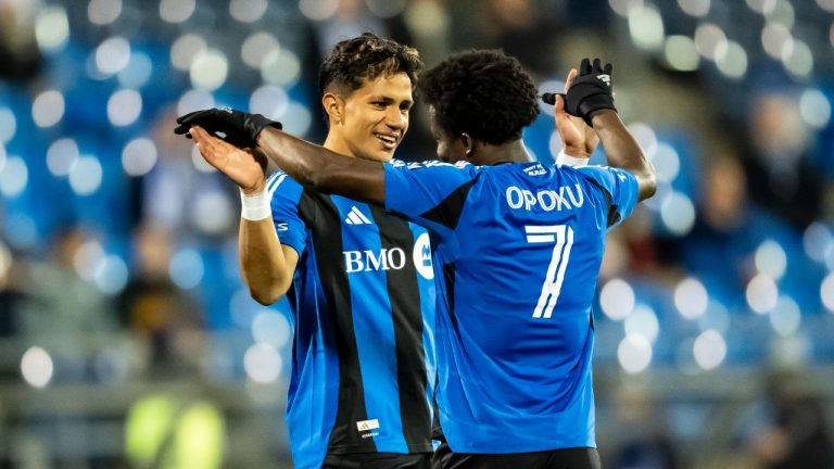 CF Montreal's Wiki Carmona (16) celebrates with teammate Kwadwo Opoku (7) after scoring against Calgary Blizzard CF during second half Canadian Championship soccer action in Montreal, on Wednesday, May 6, 2026. (Christopher Katsarov/CP)