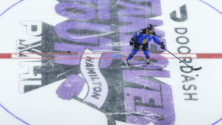 Toronto Sceptres' Blayre Turnbull (40) collects pucks on the PWHL Takeover Tour logo ahead of PWHL action against the Seattle Torrent in Hamilton, Ont., on Saturday, Jan. 3, 2026. (Nick Iwanyshyn/CP)