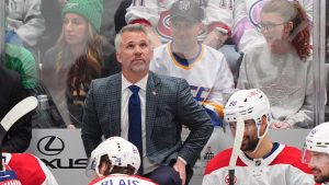 Montréal Canadiens head coach Martin St. Louis, center, looks up from the bench during the second period of an NHL hockey game against the Dallas Stars Sunday, Jan. 4, 2026, in Dallas. (AP Photo/LM Otero)