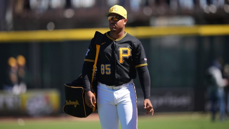 Pittsburgh Pirates' Esmerlyn Valdez walks onto the field before a spring training baseball game, Monday, Feb. 23, 2026, in Bradenton. (AP Photo/Matt Slocum)