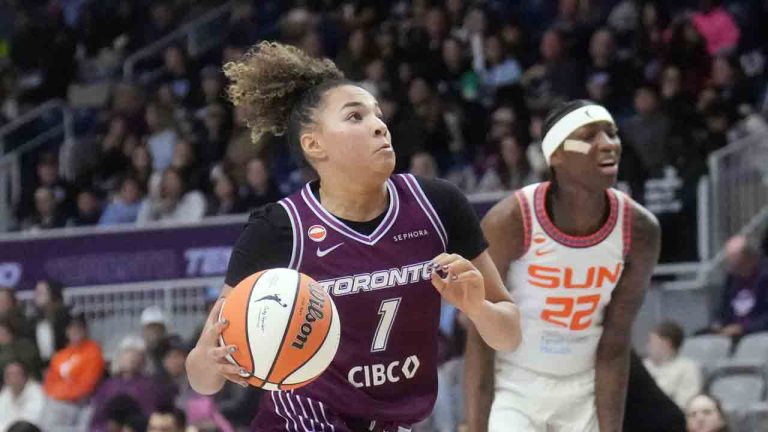 Toronto Tempo Kiki Rice (1) drives to the basket to score as she is surrounded by Connecticut Sun players during second half pre-season WNBA basketball action in Toronto on Wednesday, April 29, 2026. (Nathan Denette/CP)