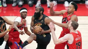 Cleveland Cavaliers' James Harden (1) is surround by Toronto Raptors during first half NBA playoff basketball action in Toronto on Friday, May 1, 2026. (Nathan Denette/CP)