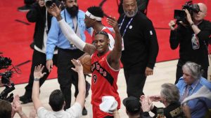 Toronto Raptors' RJ Barrett (9) celebrates the win over the Cleveland Cavaliers with fans during NBA playoff basketball action in Toronto on Friday, May 1, 2026. (Nathan Denette/CP)
