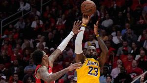 Los Angeles Lakers forward LeBron James (23) shoots against Houston Rockets forward Jabari Smith Jr. (10) during the first half of Game 6 of a first-round NBA playoffs basketball series in Houston, Friday, May 1, 2026. (Ashley Landis/AP)