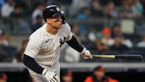 New York Yankees' Aaron Judge hits a single during second inning of a baseball game against the Baltimore Orioles Friday, May 1, 2026, in New York. (AP Photo/Frank Franklin II)