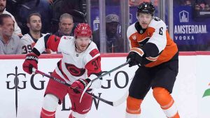 Philadelphia Flyers' Travis Sanheim, right, and Carolina Hurricanes' Andrei Svechnikov battle for the puck during the first period of Game 3 in the second round of the NHL hockey Stanley Cup playoffs, Thursday, May 7, 2026, in Philadelphia. (Matt Slocum/AP)