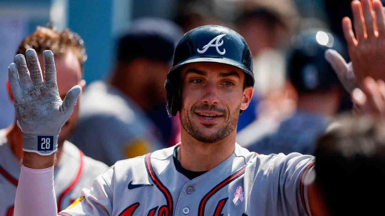 Atlanta Braves' Matt Olson is greeted by teammates after hitting a solo home run during the ninth inning of a baseball game against the Los Angeles Dodgers, Sunday, May 10, 2026, in Los Angeles. (Caroline Brehman/AP)