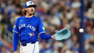Toronto Blue Jays pitcher Kevin Gausman (34) receives the ball back after making his 2000th career strikeout during fourth inning MLB baseball action against the Tampa Bay Rays, in Toronto, Monday, May 11, 2026. (Frank Gunn/CP)