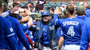 Toronto Blue Jays' Yohendrick Piñango, center, is congratulated in the dugout after hitting a home run during the seventh inning of a baseball game against the Detroit Tigers, Saturday, May 16, 2026, in Detroit. (Jose Juarez/AP)