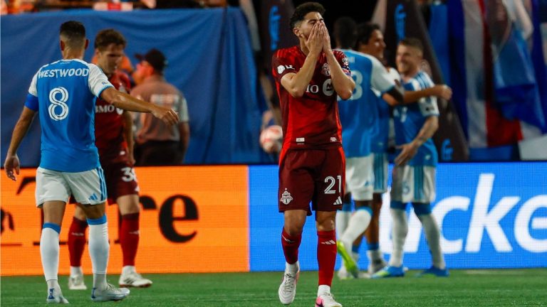 Toronto FC midfielder Jonathan Osorio (21) reacts after Charlotte FC scored on a penalty kick during the second half of an MLS soccer match in Charlotte, N.C., Saturday, May 16, 2026. (AP Photo/Nell Redmond)