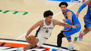 San Antonio Spurs guard Dylan Harper (2) controls the ball during the second half of Game 2 in the Western Conference finals NBA basketball playoffs series against the Oklahoma City Thunder Wednesday, May 20, 2026, in Oklahoma City. (Tony Gutierrez/AP)