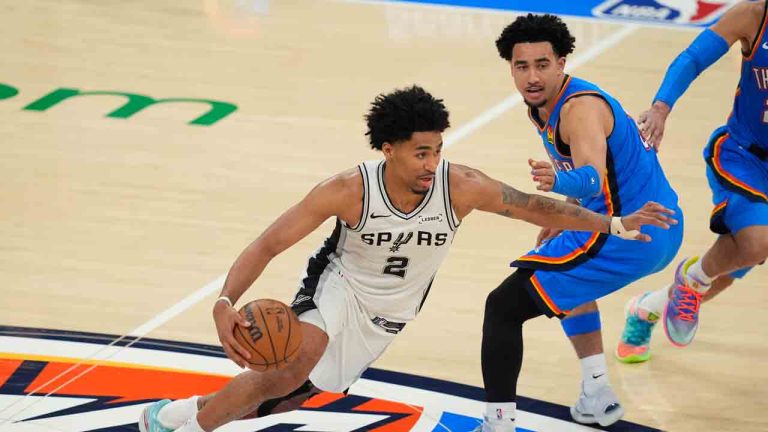 San Antonio Spurs guard Dylan Harper (2) controls the ball during the second half of Game 2 in the Western Conference finals NBA basketball playoffs series against the Oklahoma City Thunder Wednesday, May 20, 2026, in Oklahoma City. (Tony Gutierrez/AP)