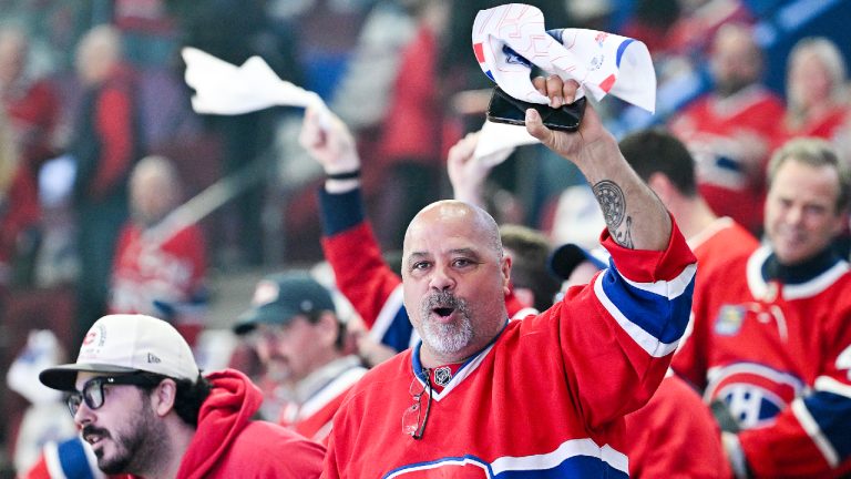 Montreal Canadiens fans cheer on their team as they come on to the ice for warmups before the Canadiens face the Carolina Hurricanes in third round, Game 3, NHL playoff action in Montreal on Monday, May 25, 2026. (Graham Hughes/CP)