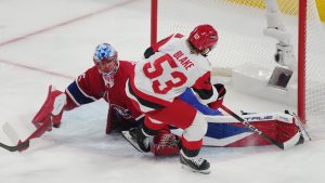 Carolina Hurricanes' Jackson Blake (53) is stopped by Montreal Canadiens goaltender Jakub Dobes (75) during the first period of Game 4 of NHL Eastern Conference final Stanley Cup playoff series action in Montreal on Wednesday, May 27, 2026. (Christinne Muschi/CP)