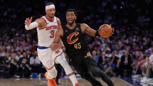 Cleveland Cavaliers' Donovan Mitchell, right, moves past New York Knicks' Josh Hart, left, during the first half of Game 1 in the Eastern Conference finals NBA basketball playoffs series, Tuesday, May 19, 2026, in New York. (Seth Wenig/AP)
