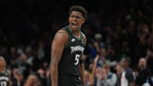 Minnesota Timberwolves guard Anthony Edwards (5) reacts after scoring against the San Antonio Spurs during the second half of Game 4 of an NBA basketball second-round playoffs series in Minneapolis, Sunday, May 10, 2026. (Abbie Parr/AP)