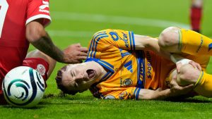 Tigres' Marcelo Flores grimaces in pain during the Concacaf Champions Cup final soccer match against Toluca in Toluca, Mexico, Saturday, May 30, 2026. (Fernando Llano/AP)
