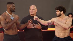 Francis Ngannou, left, faces off with Philipe Lins as Cain Velasquez watches from the middle. (Sarah Stier/Getty Images for Netflix)