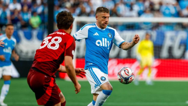 Charlotte FC midfielder Pep Biel, right, moves the ball against Toronto FC defender Jackson Gilman (38) during the first half of an MLS soccer match in Charlotte, N.C., Saturday, May 16, 2026. (Nell Redmond/AP)
