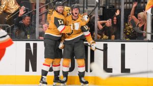 Vegas Golden Knights right wing Pavel Dorofeyev (16) celebrates his game-winning goal with defenseman Ben Hutton (17) during overtime of Game 5 of a second-round NHL hockey Stanley Cup playoff series against the Anaheim Ducks Tuesday, May 12, 2026, in Las Vegas. (Candice Ward/AP)