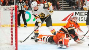 Vegas Golden Knights right wing Mitch Marner, left, scores on Anaheim Ducks goaltender Ville Husso during the second period in Game 3 of a second-round NHL hockey Stanley Cup playoff series Friday, May 8, 2026, in Anaheim, Calif. (Mark J. Terrill/AP)