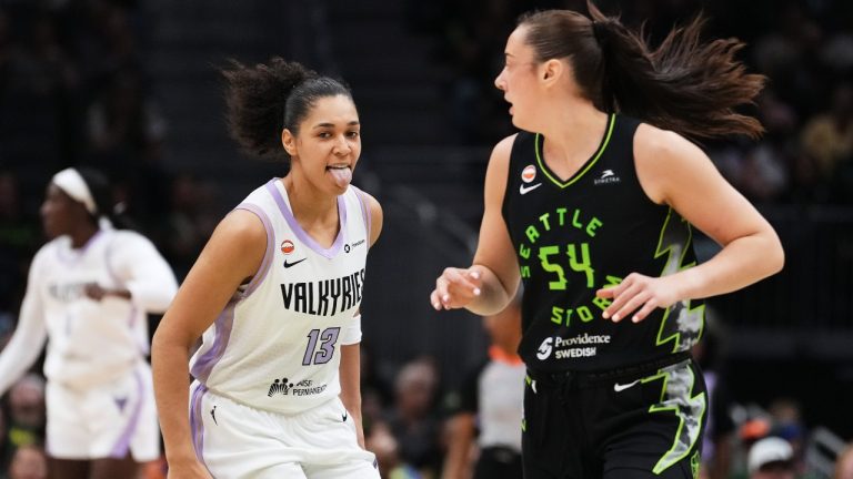 Golden State Valkyries forward Janelle Salaun (13) reacts after making a basket as Seattle Storm forward MacKenzie Holmes (54) looks back during the second half of a WNBA basketball game, Friday, May 8, 2026, in Seattle. (Lindsey Wasson/AP)
