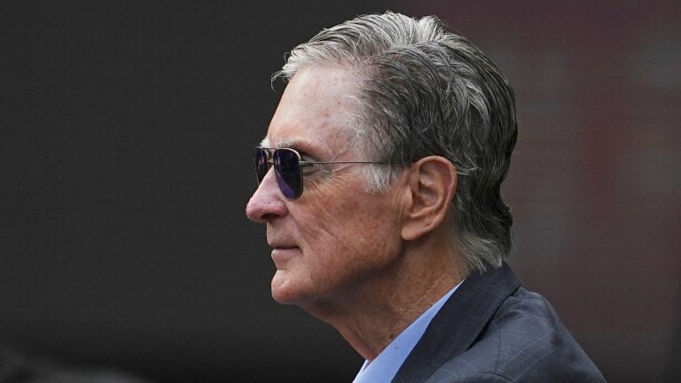 Boston Red Sox owner John Henry stands in the dugout before an opening-day baseball game against the Texas Rangers, Thursday, March 27, 2025, in Arlington, Texas. (Tony Gutierrez/AP)
