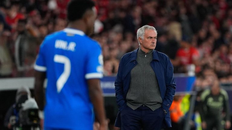 Vinicius Junior of Real Madrid CF and Jose Mourinho, Benfica Coach, in action during UEFA Champions League knockout play-offs first leg between SL Benfica and Real Madrid CF at Estadio da Luz in Lisbon, Portugal. (AP)
