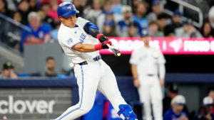 Toronto Blue Jays third baseman Kazuma Okamoto (7) hits a single during first inning MLB baseball action against the Los Angeles Dodgers, in Toronto on Monday, April 6, 2026. (Frank Gunn/CP)