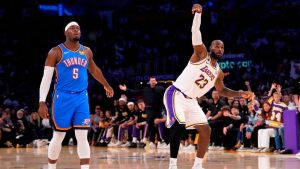 Los Angeles Lakers forward LeBron James, right, watches along with Oklahoma City Thunder guard Luguentz Dort as his shot misses during the first half of Game 3 in an NBA Playoffs second-round series Saturday, May 9, 2026, in Los Angeles. (Mark J. Terrill/AP)